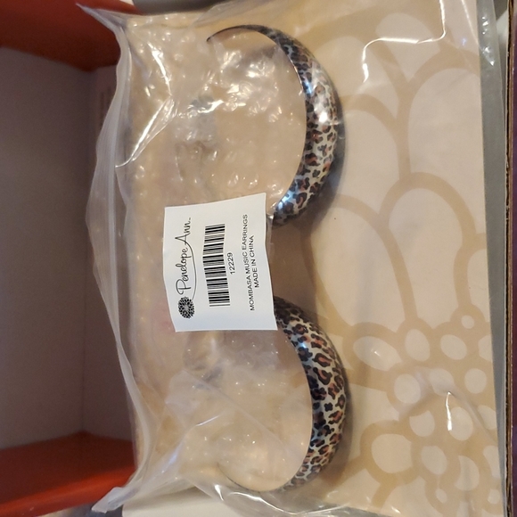 Mombasa Music leopard print earrings from Celebrating Home. 2.5 inches in length - Picture 2 of 6